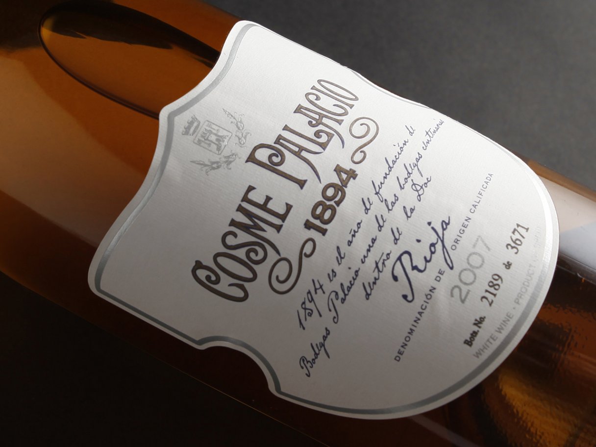 Rooftops of a coastal town with the sea in background