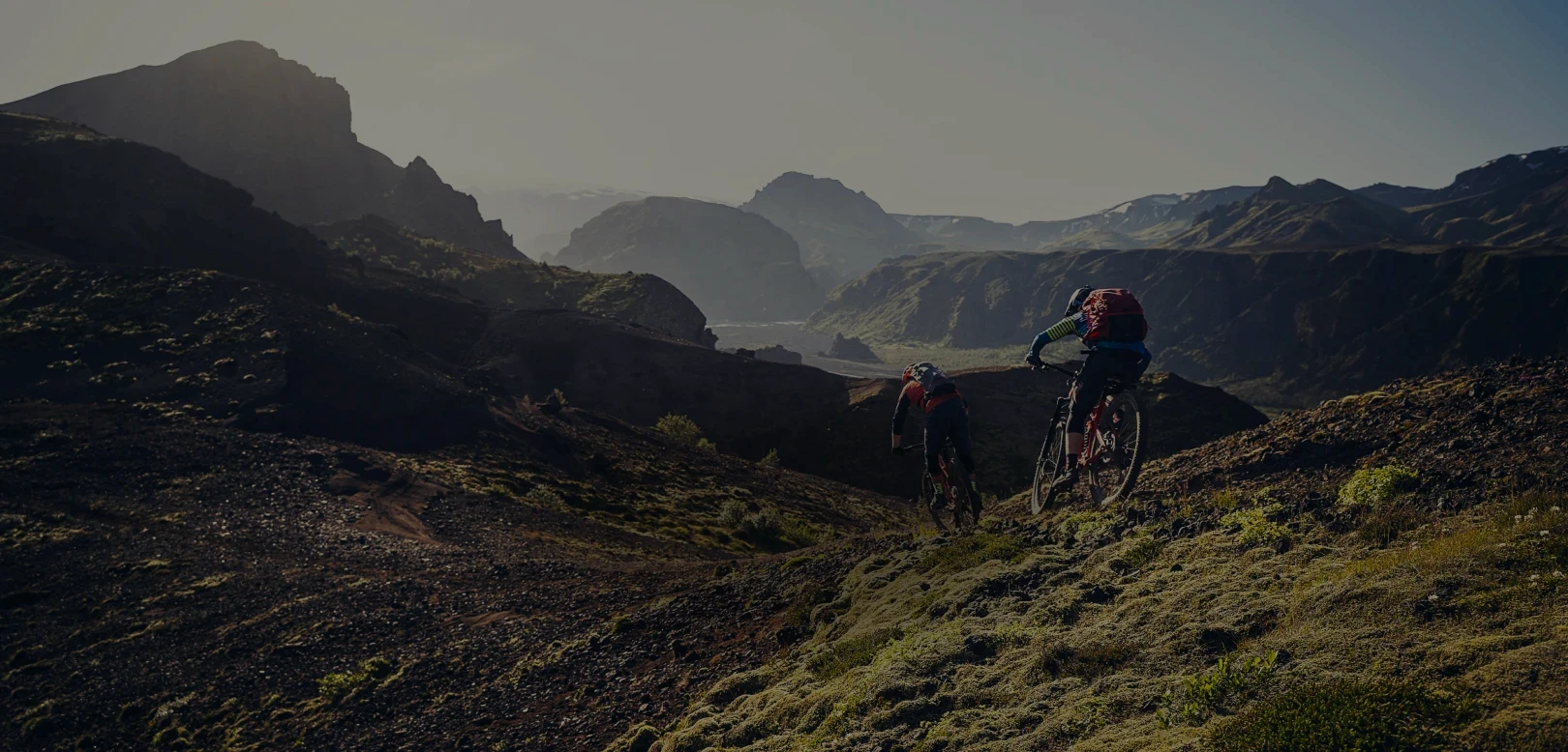 Riders going down a hill