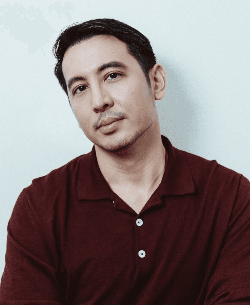 Cheerful Man in Brown Shirt