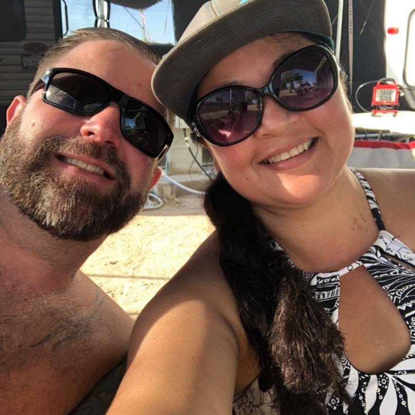 woman smiling wearing denim jacket