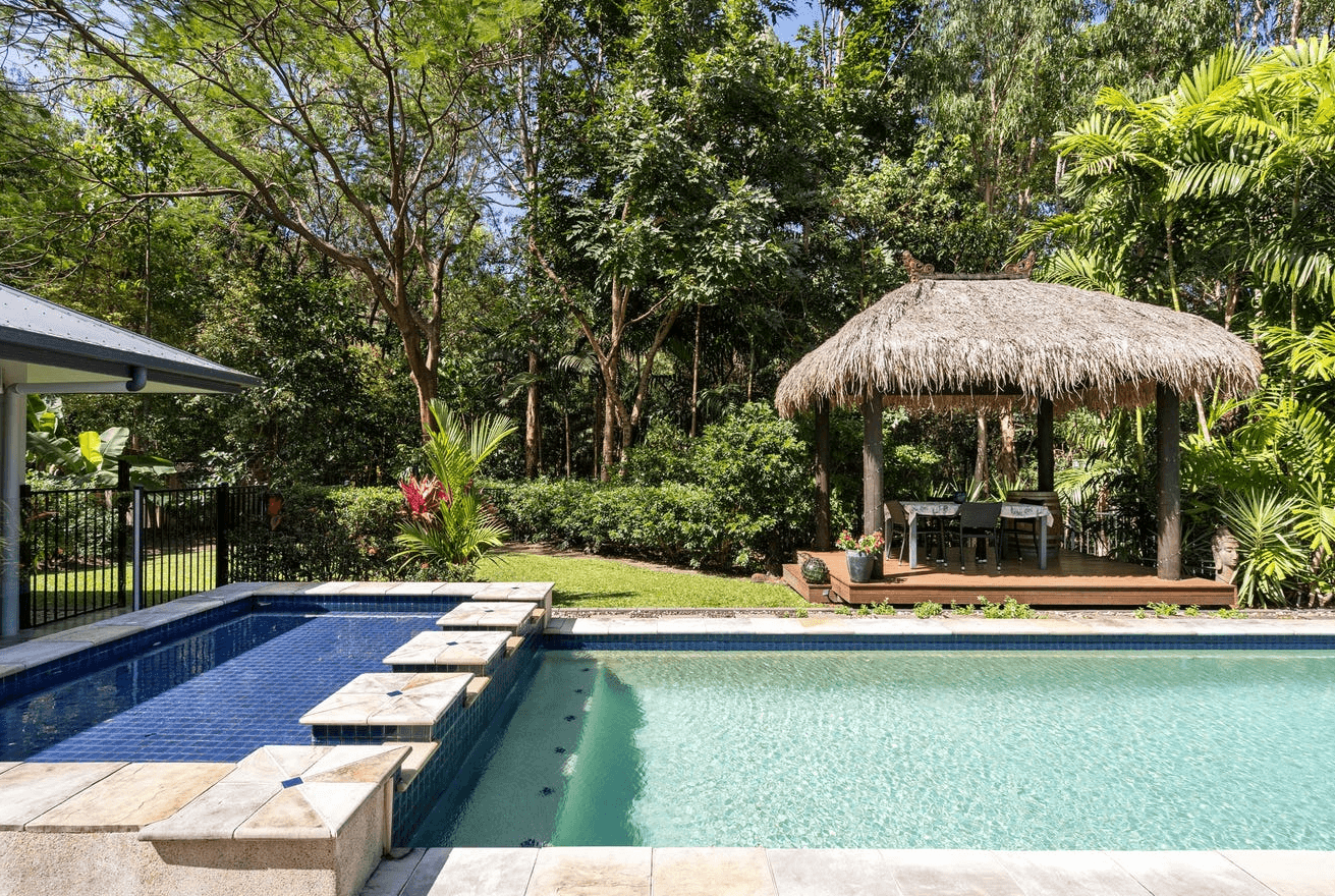 a person in a blue mask and a mask holding a ladder