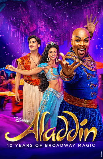 Aladdin Broadway production shot. There is a glittering golden background. Aladding and the genie stand together elevated in the center. In front of them there is a line of dancers in golden outfits dancing with canes held upright.
