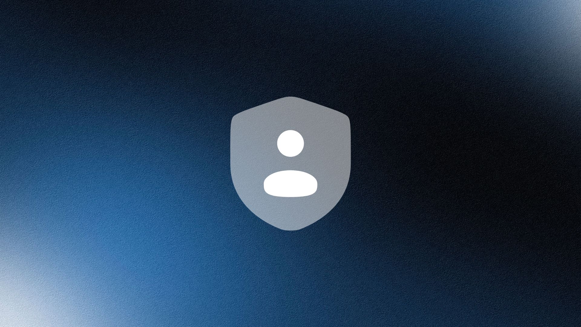 Two professionals standing confidently in front of bookshelves, both with arms crossed, in a softly lit office.