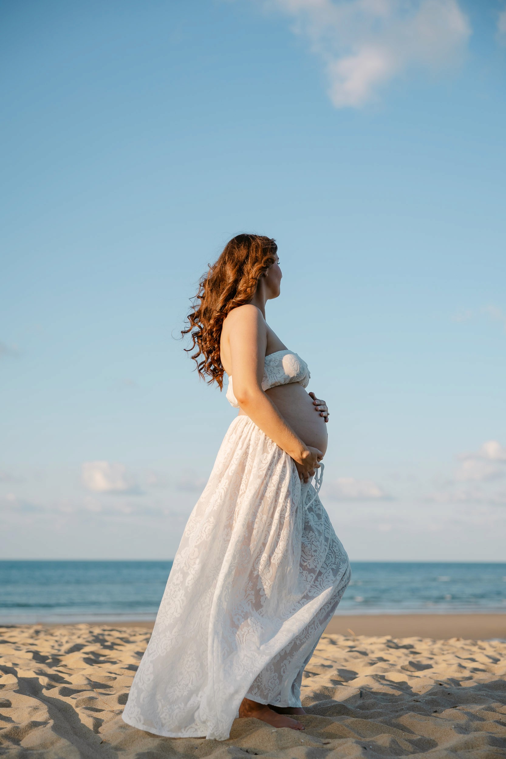 Maternity photo of pregnant mother at the beach in Mackay QLD