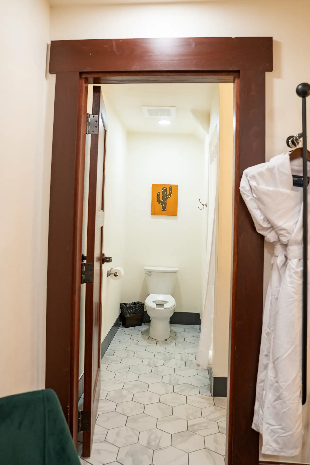Bathroom with hexagon tile floor and shower