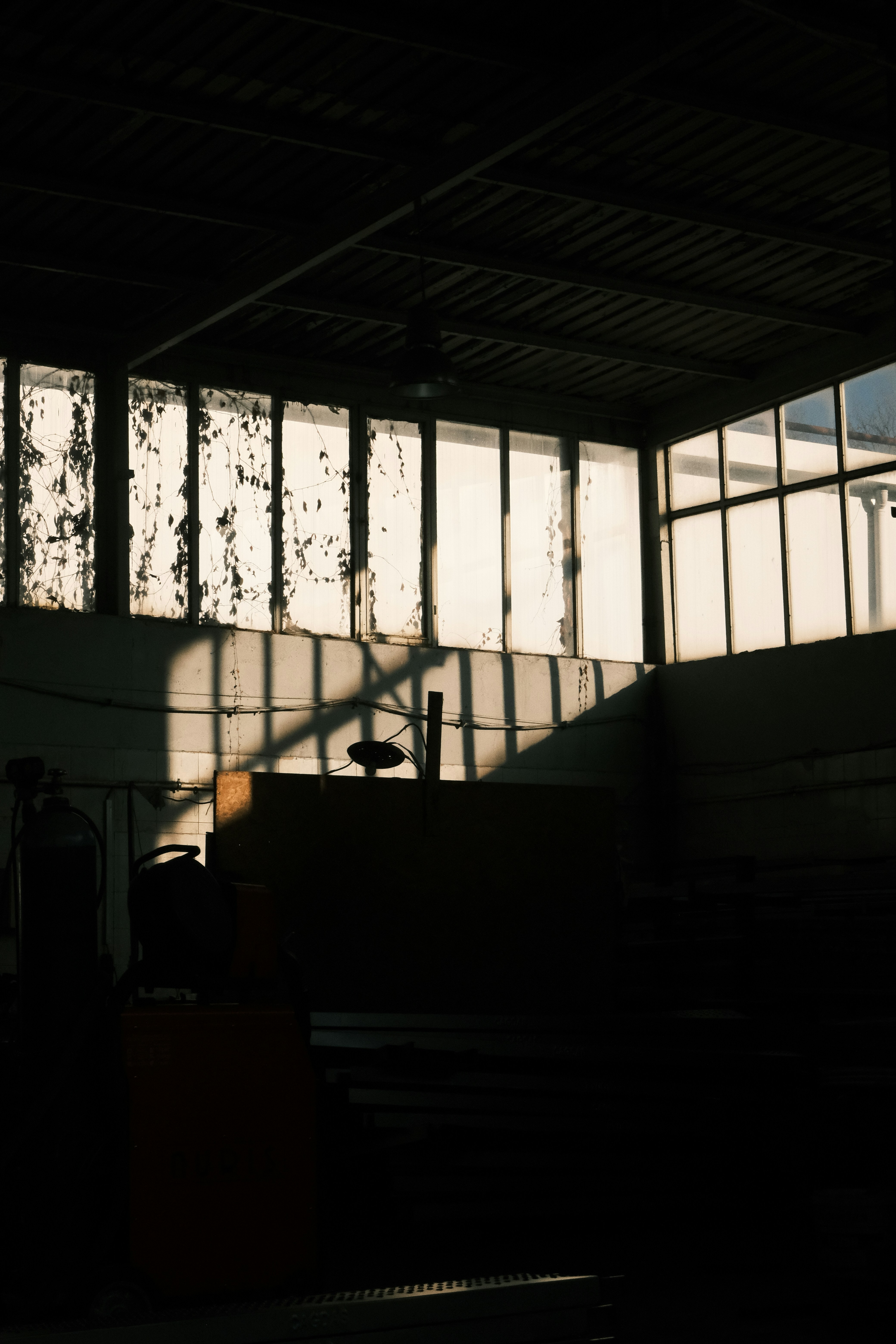 A side profile of a factory worker in a factory