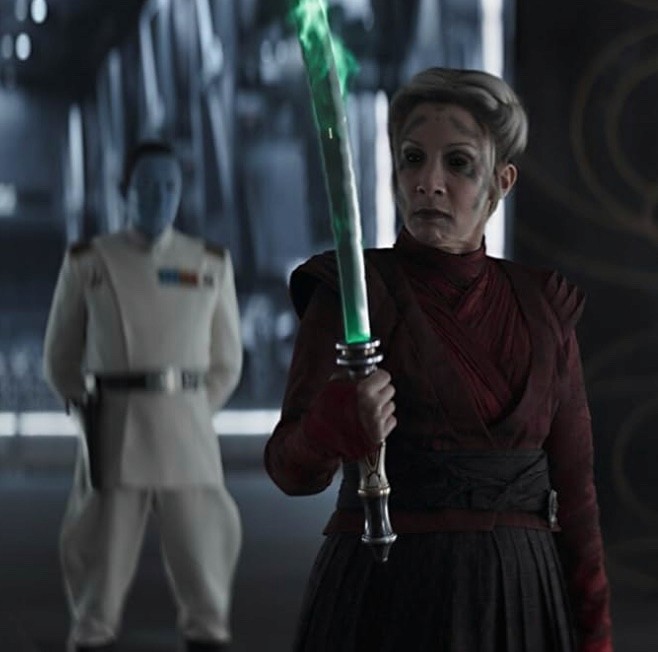 Morgan Elsbeth holding a green blade with Grand Admiral Thrawn in the background