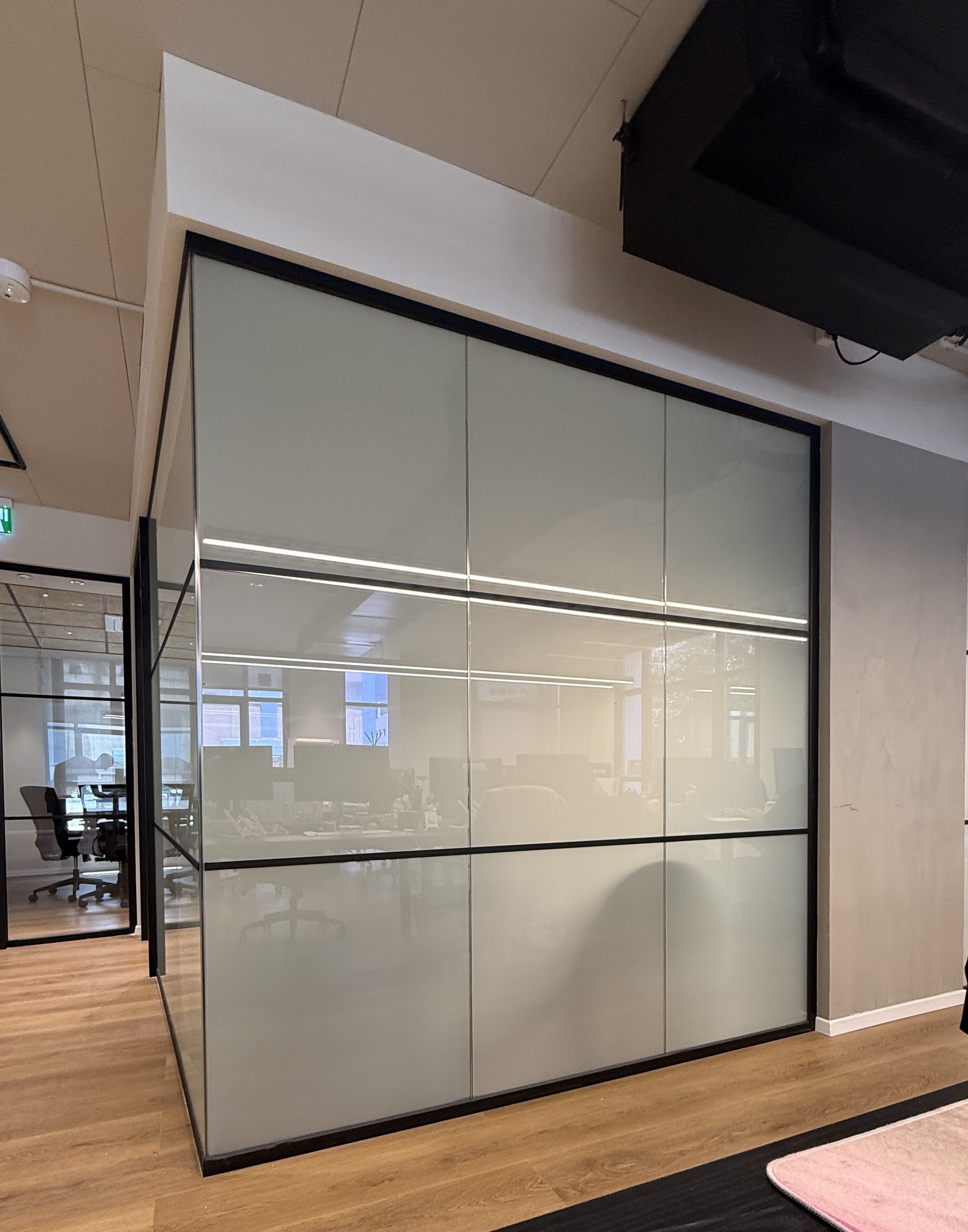 Office with a frosted smart glass partition