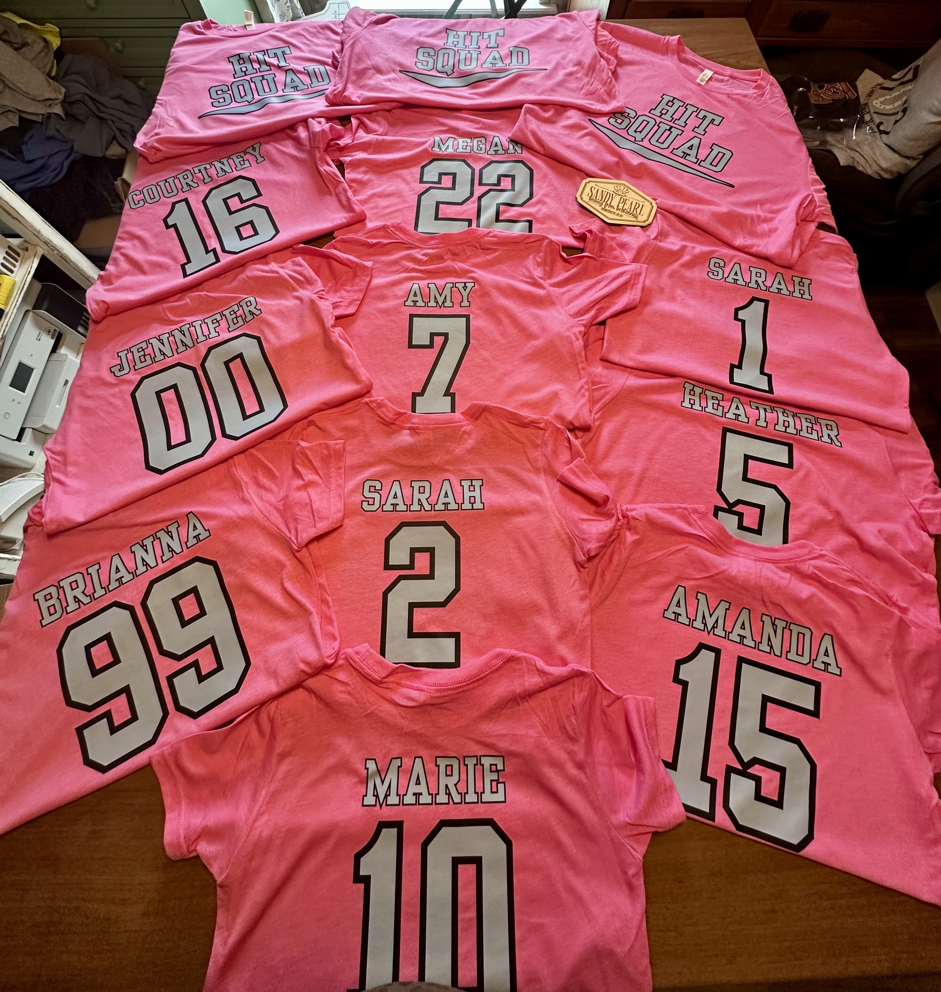 Team members wearing coordinated custom shirts