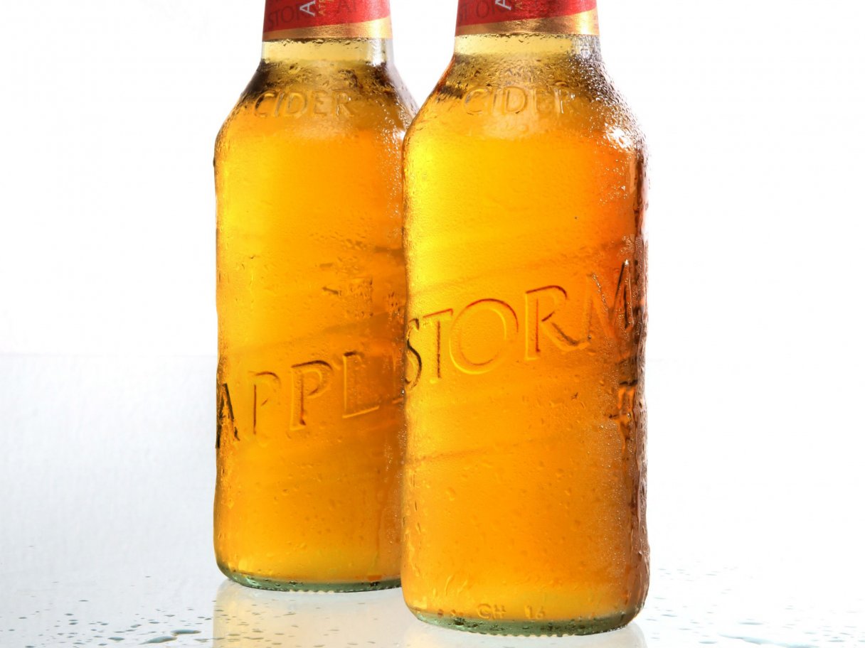 Rooftops of a coastal town with the sea in background