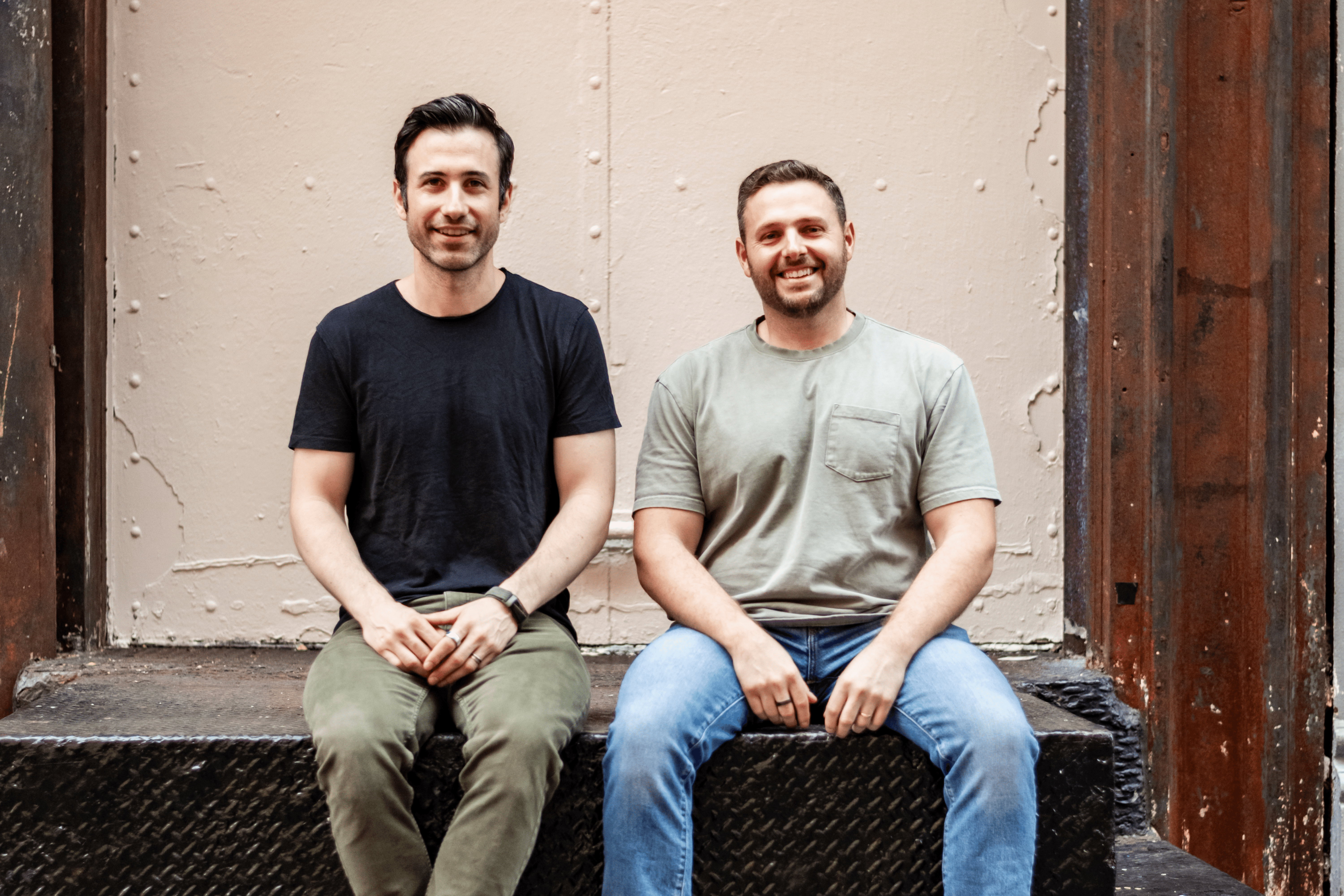 Jetty’s cofounders sitting together on a doorstep