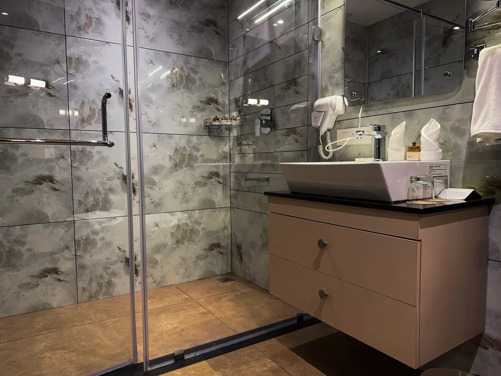 "Unwind in the exclusive indoor pool of our Premium Pool Villa at Au Revoir Wellness Resort – A perfect blend of luxury and serenity.