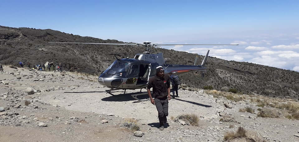Medical evacuation helicopter on the slopes of Mount Kilimanjaro