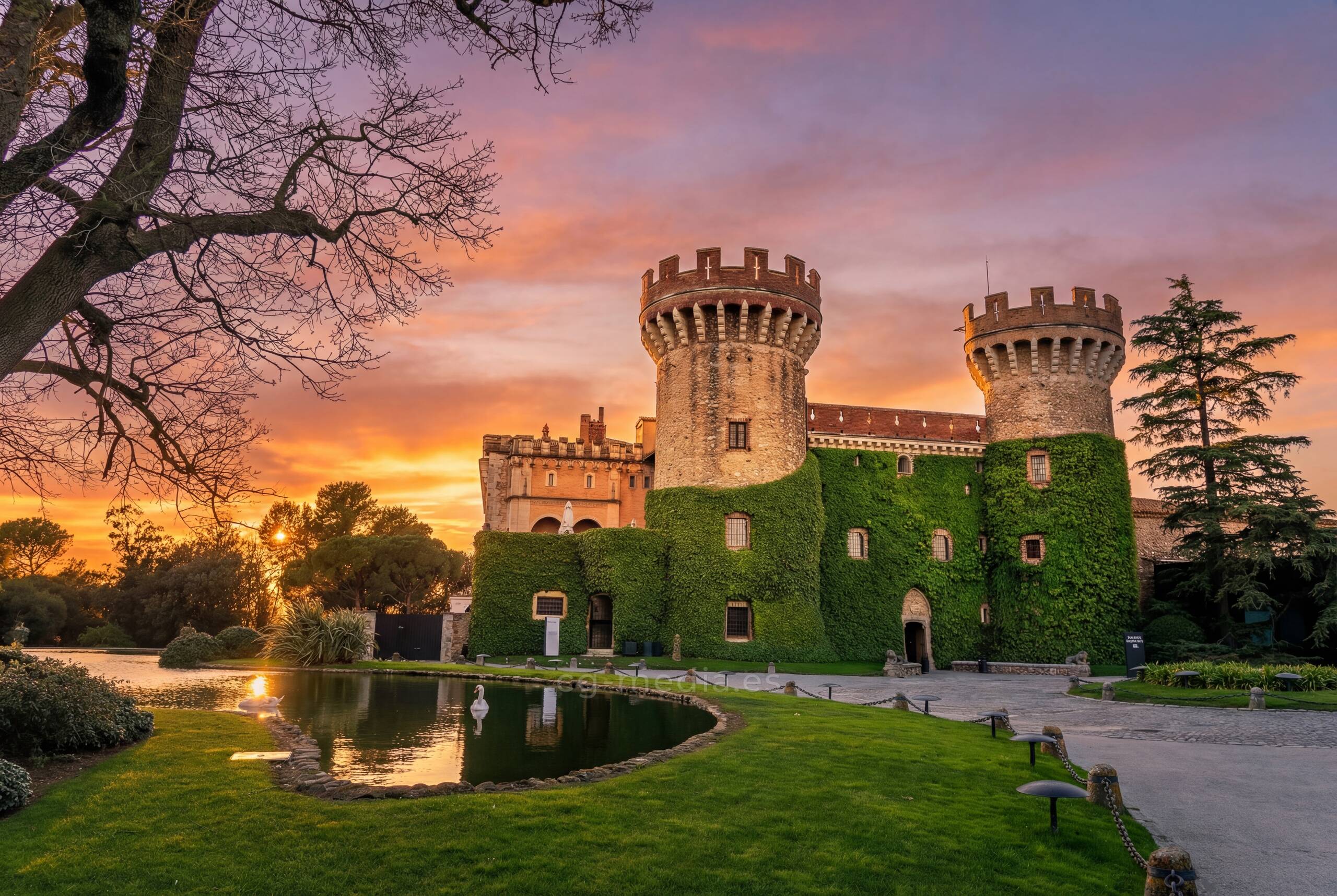Woman with closed eyes is surrounded by vibrant, colorful, flowing fabric creating an artistic, dreamy effect.