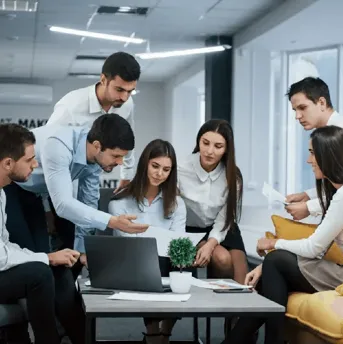 Business professionals collaborating with Microsoft Dynamics 365 to manage business accounting and financial operations.