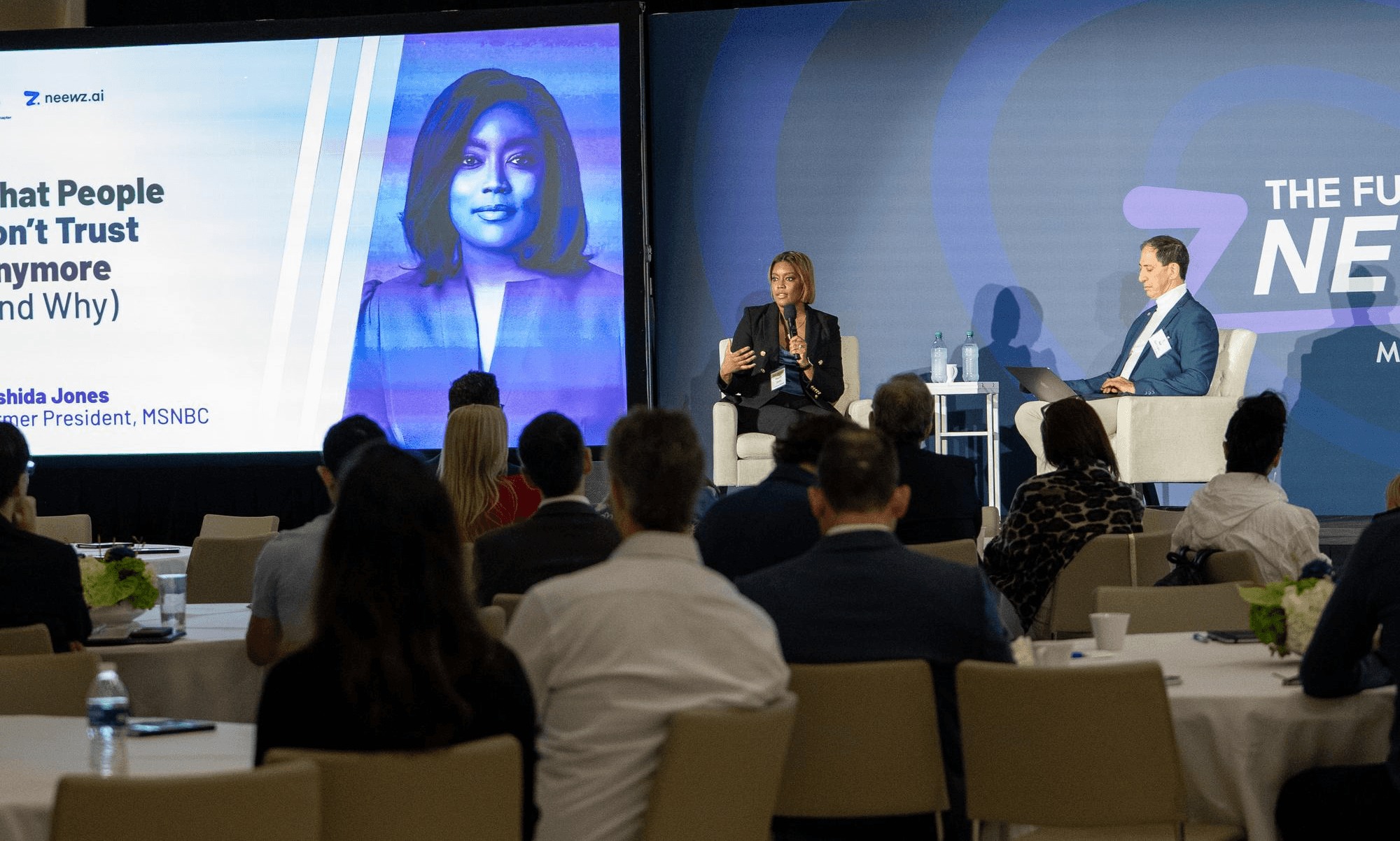 Rashida Jones in a fireside-chat format during a conference session.