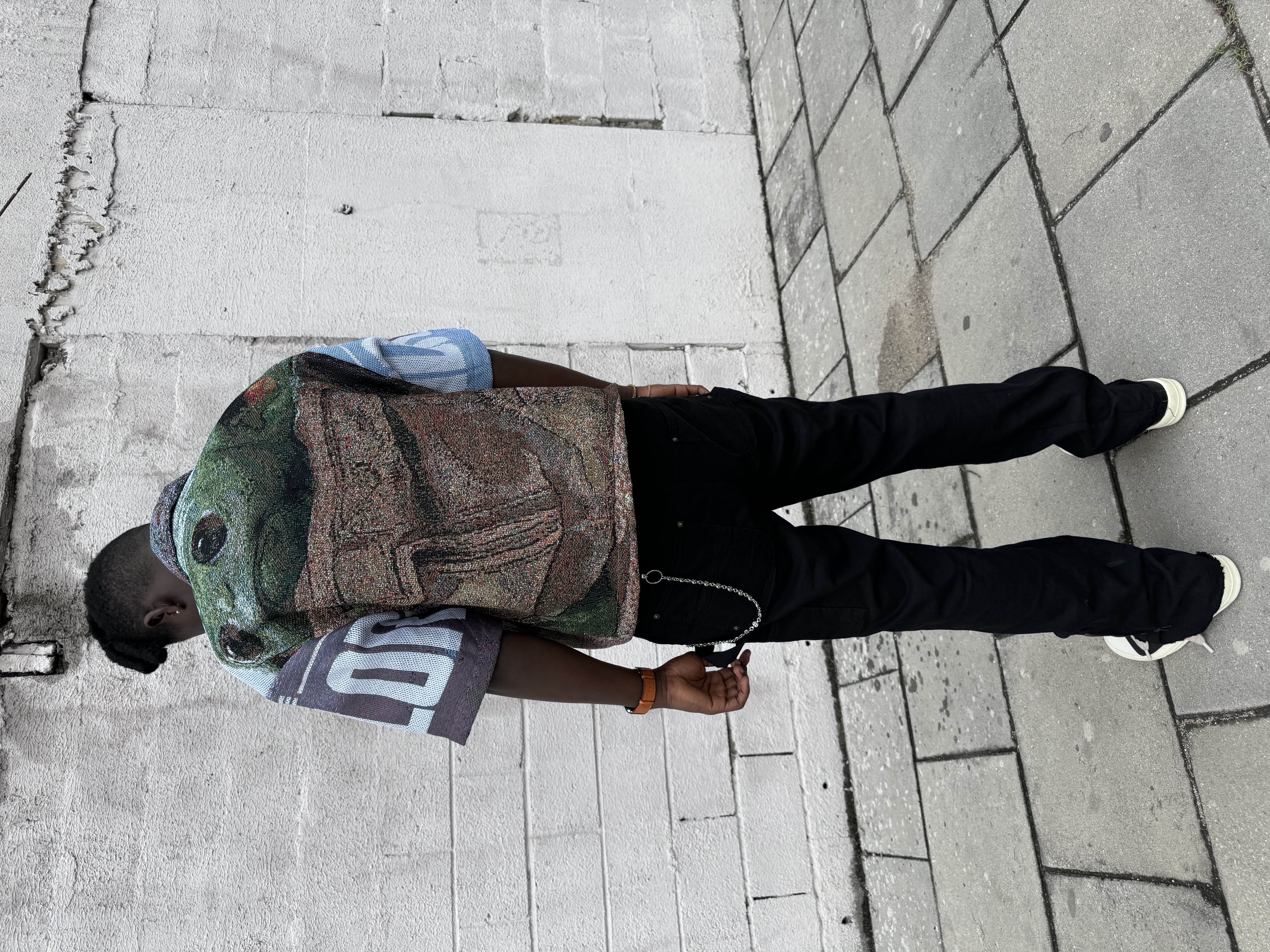 blue denim jeans on white textile