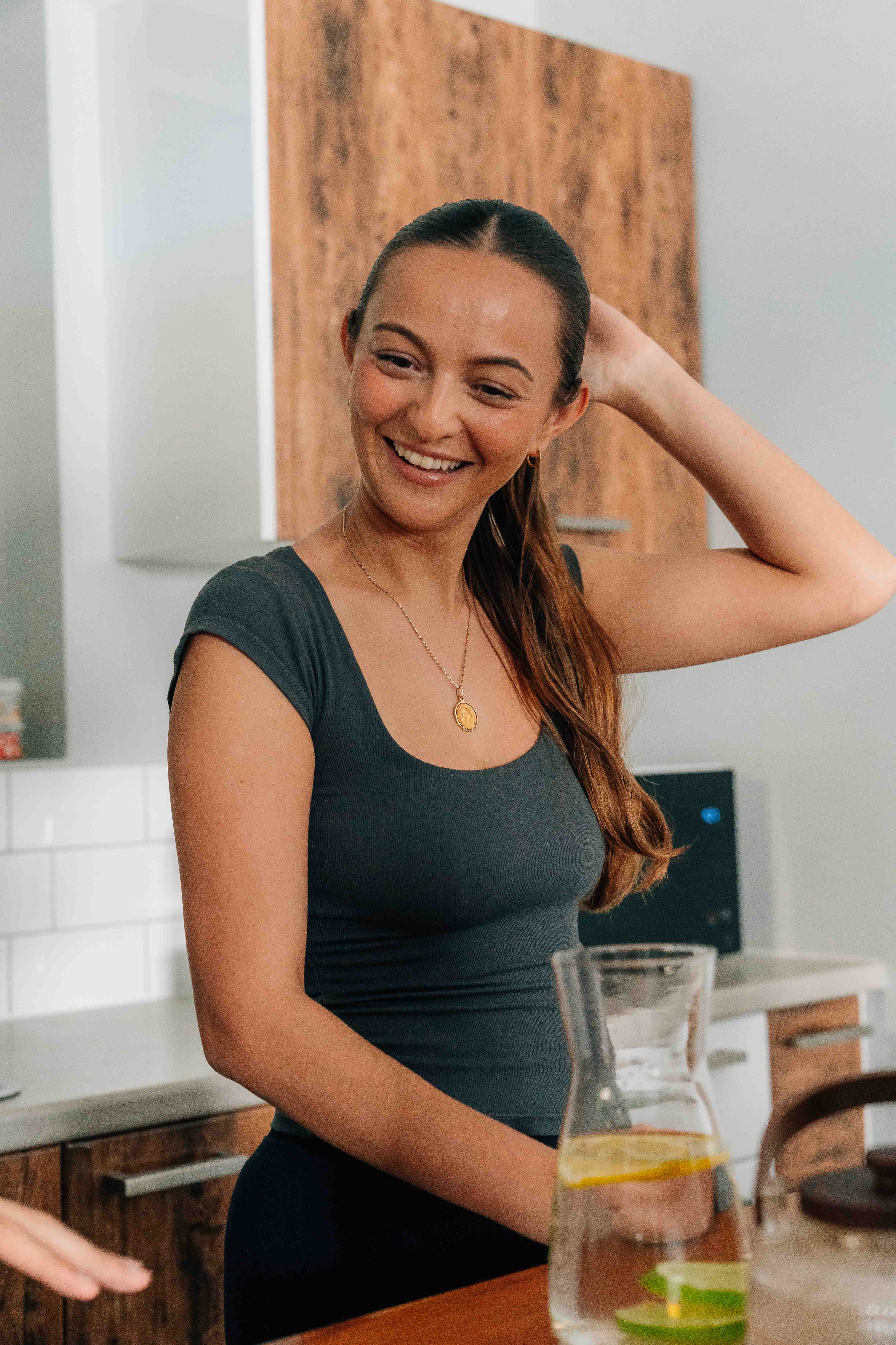 man in black long sleeve shirt sitting by the table