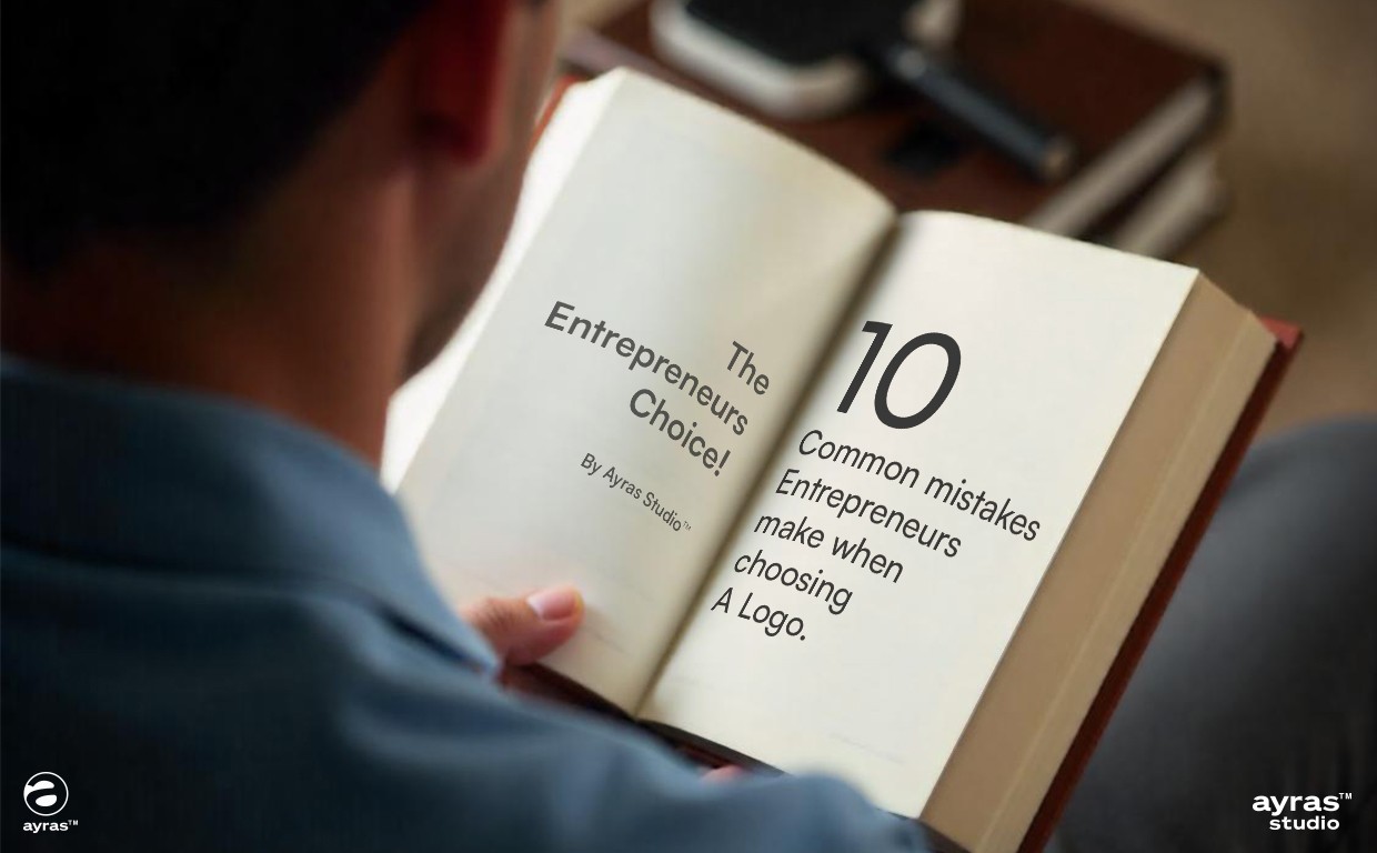 Entrepreneur choosing a logo design on laptop while reviewing branding mistakes to avoid, including font, color, and style errors.