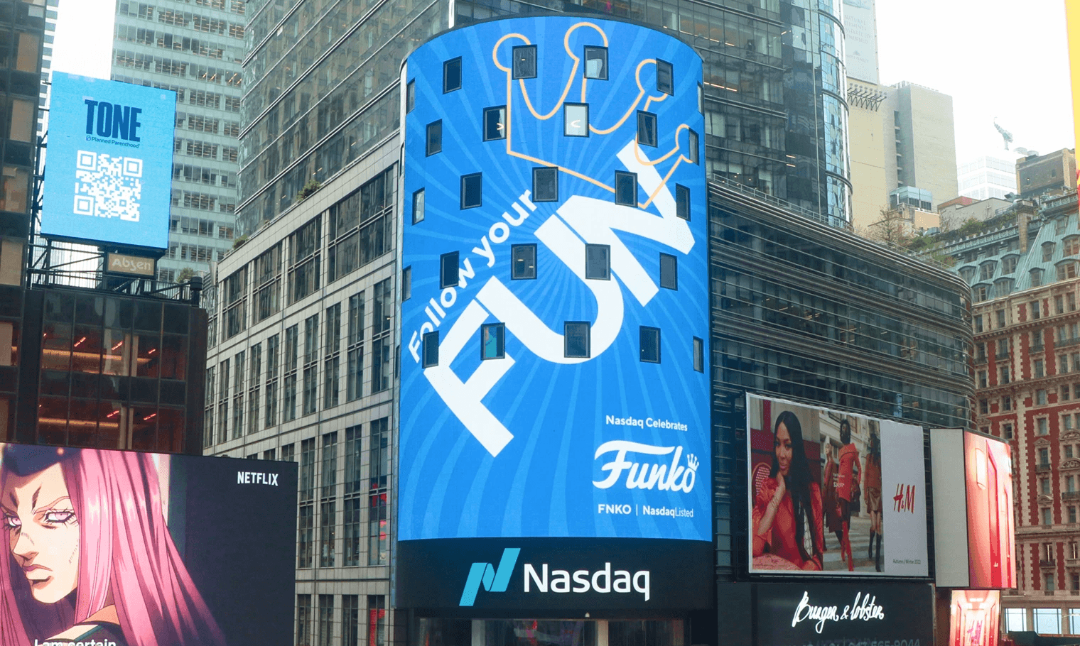 A times square billboard celebrating Funko's status as a publicly traded company