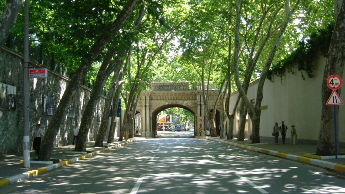 Tree-lined Çırağan Street walking route between Beşiktaş and Ortaköy in Istanbul.