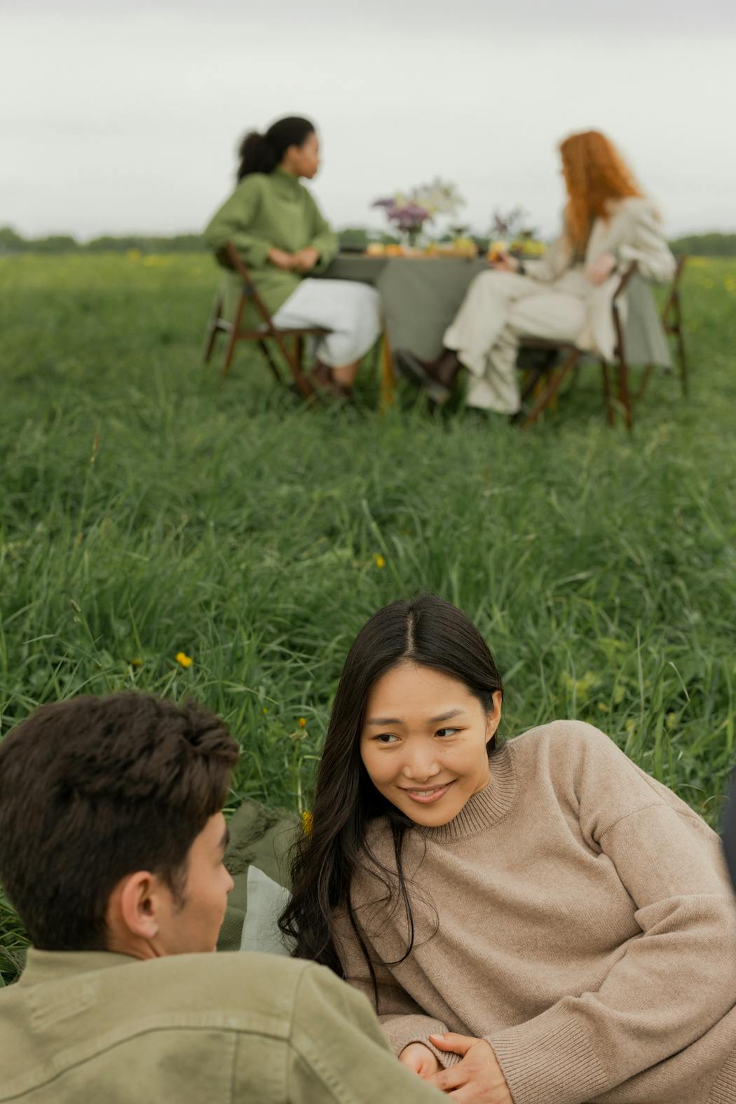Couple talking in a field