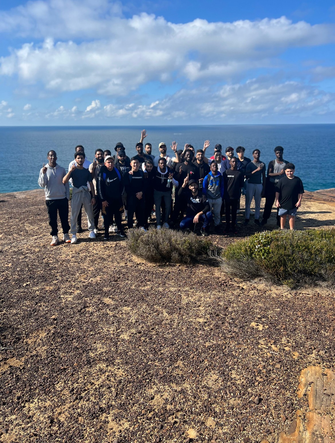a black and white living room with a large tv