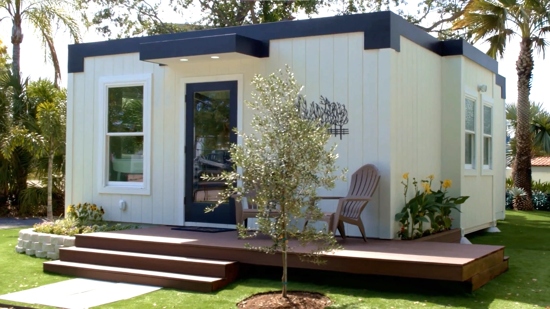 Mesocore Model E ADU exterior with wood siding and rental-ready covered deck