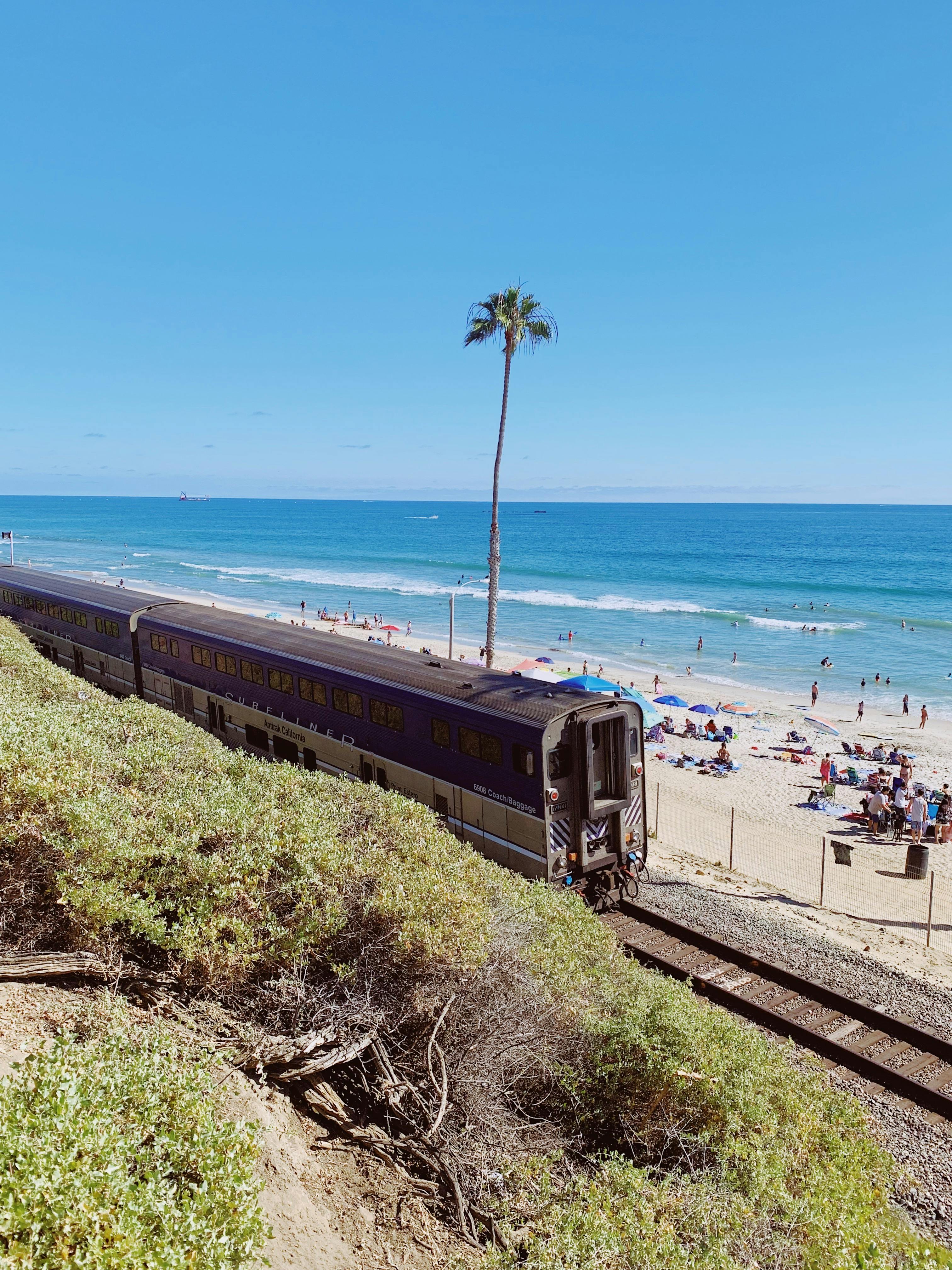train on tracks near a beach – surfboard rental in san-clemente