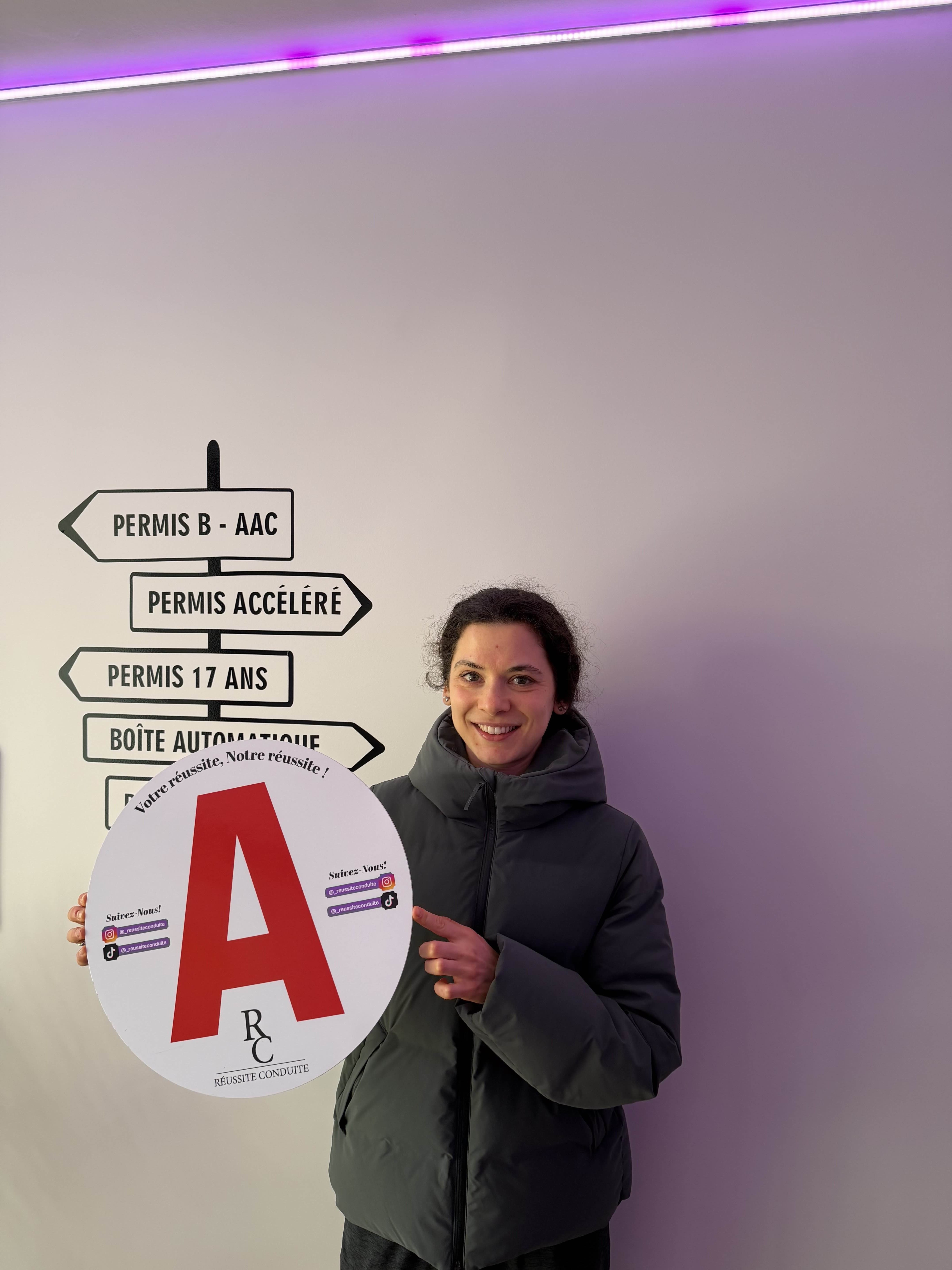 man in black jacket holding blue tablet computer