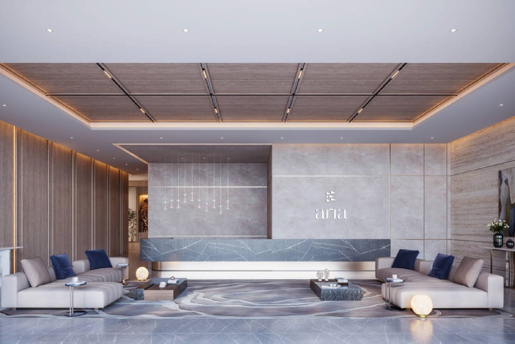 Contemporary lobby with a cozy couch and a dining space, showcasing ARIA by Beyond's design
