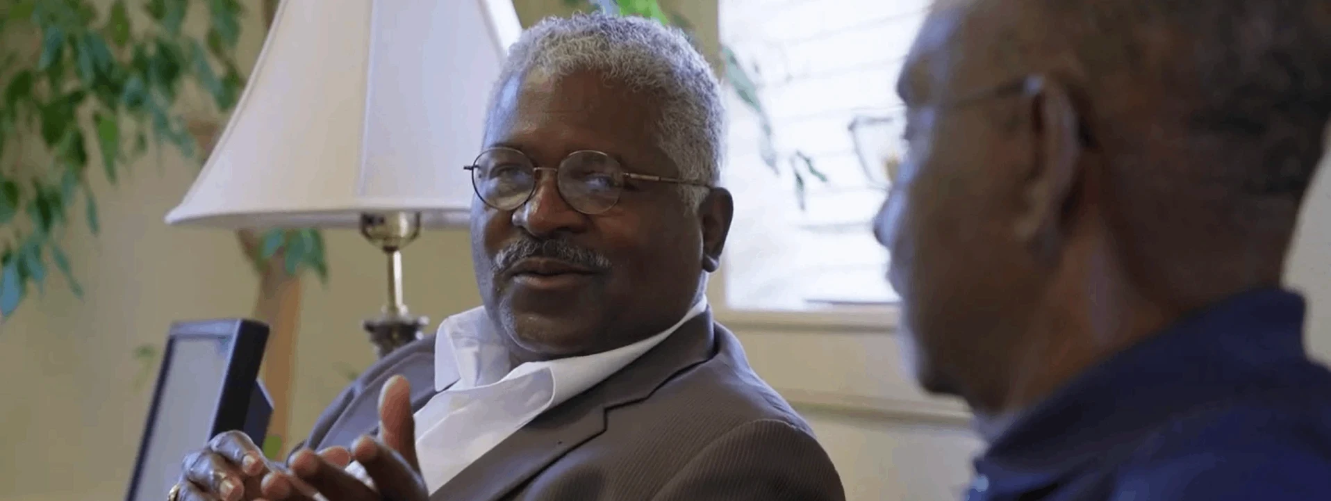 Two St. Mark AME Zion members in conversation