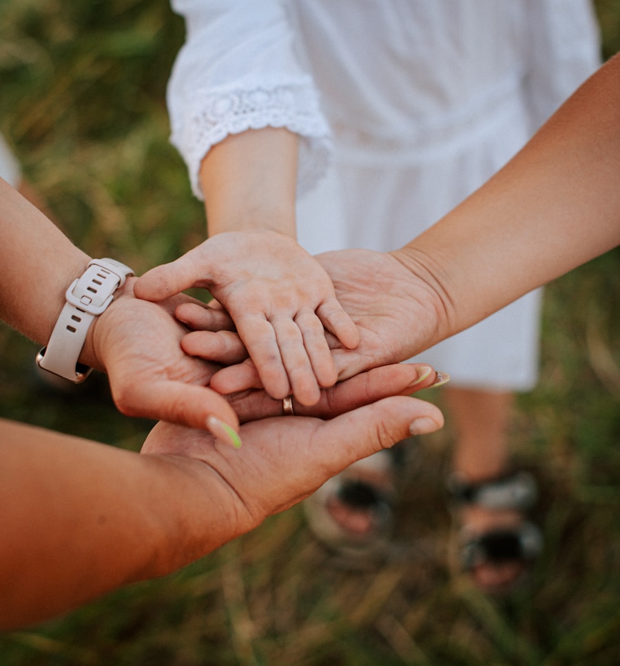 Two people holding hands