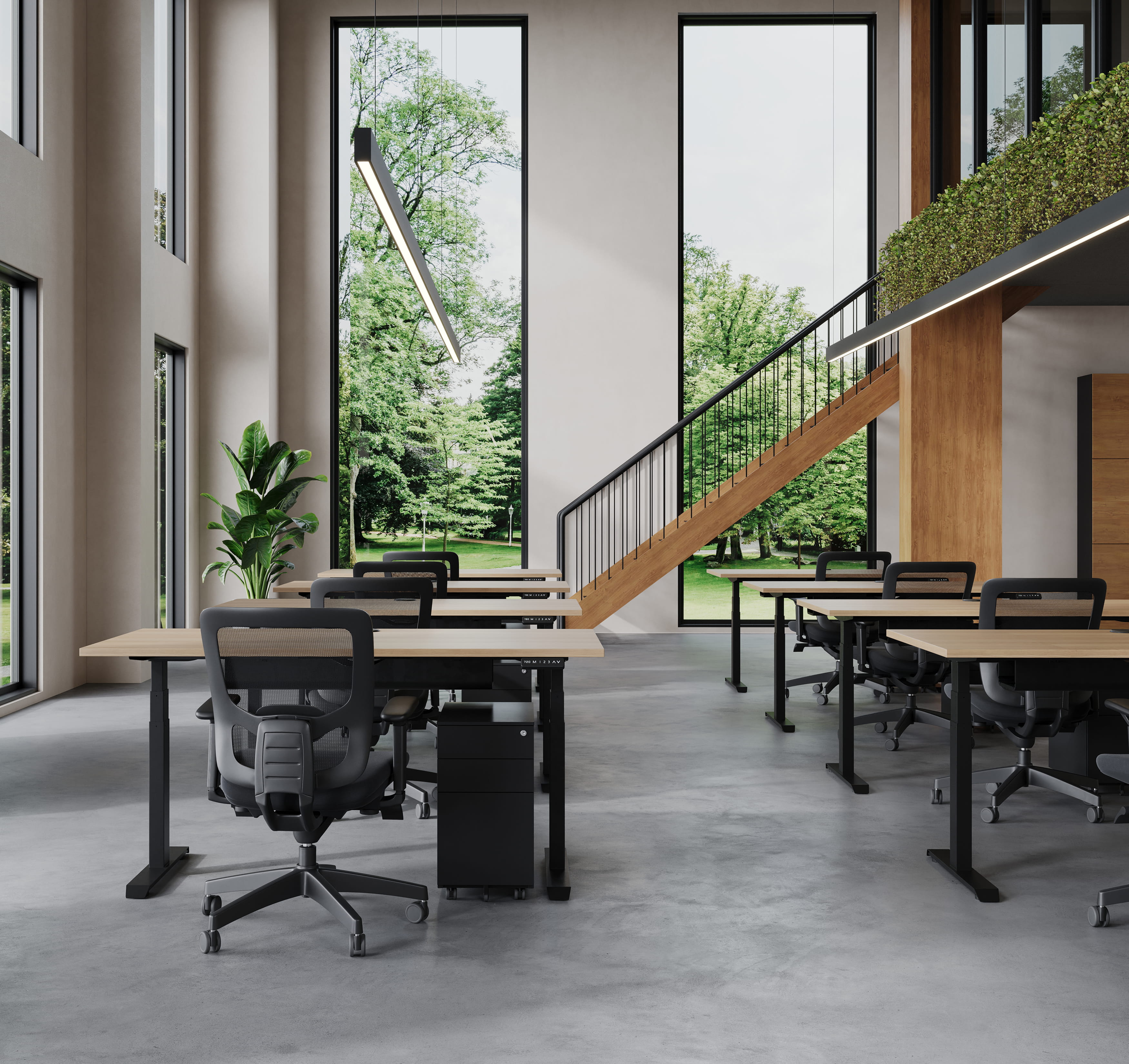 Modern office workspace with desks, chairs, and staircase in open interior design
