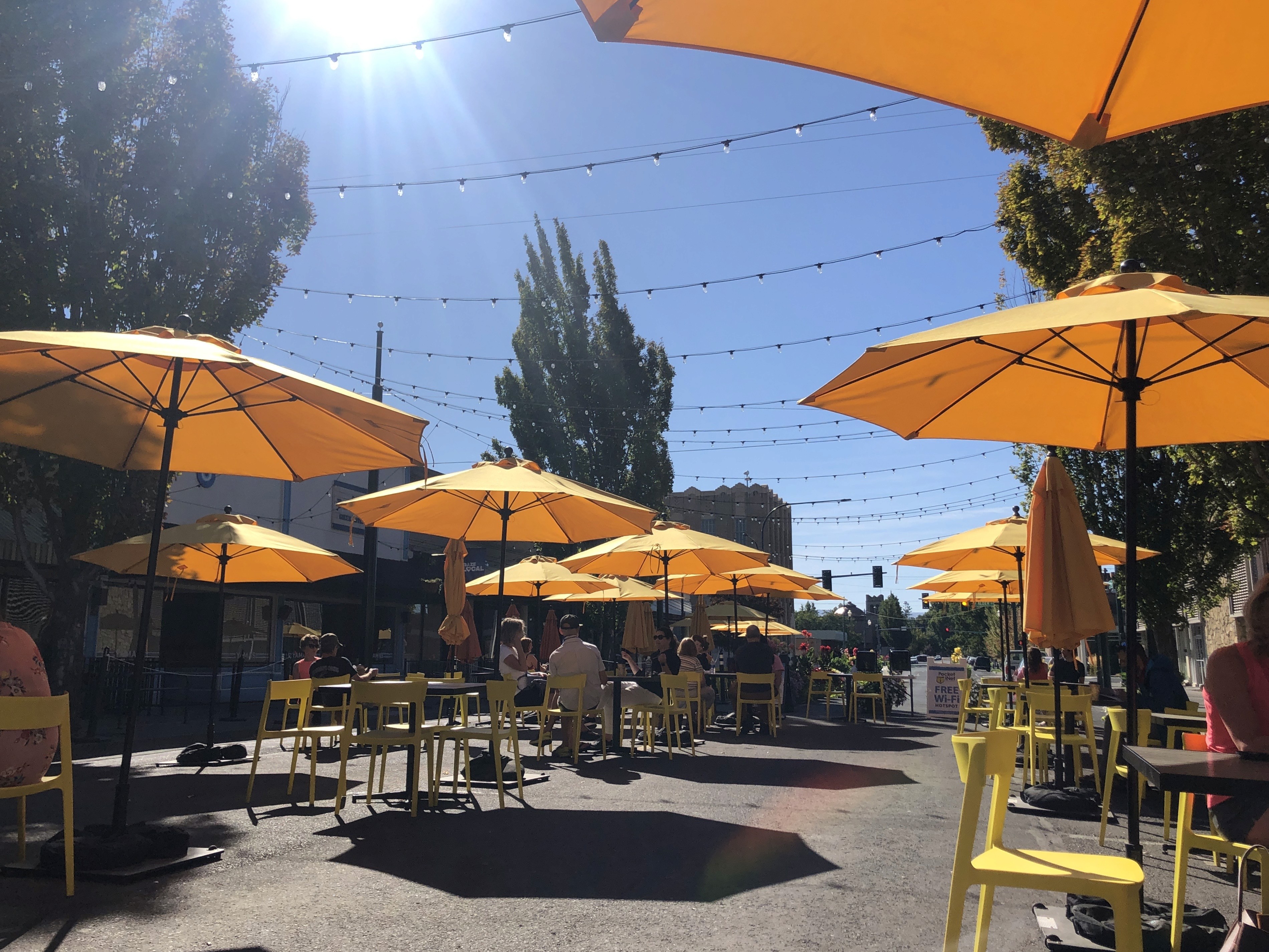 Outdoor dining under string lights on a Walla Walla downtown street