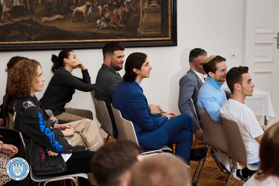 Students listening toMag. Berthold Baurek-Karlic, founder and managing director of Venionaire Capital