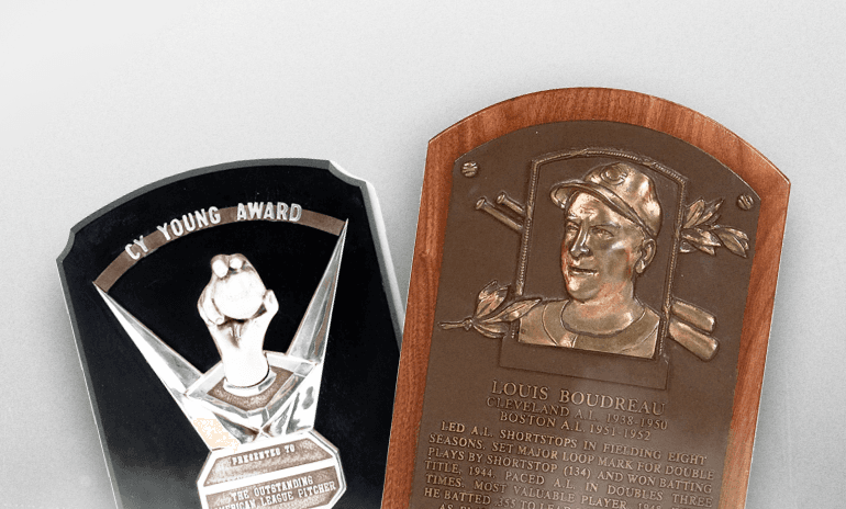 Baseball awards including Rookie of the Year trophy and Hall of Fame plaque