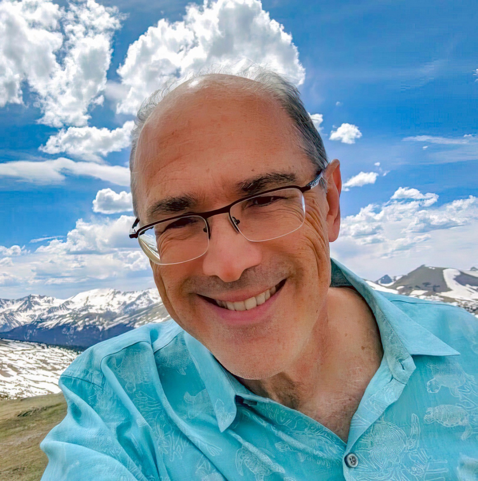 A black and white headshot of Carl Page