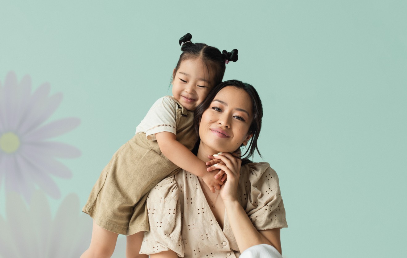 little girl hugging her mother