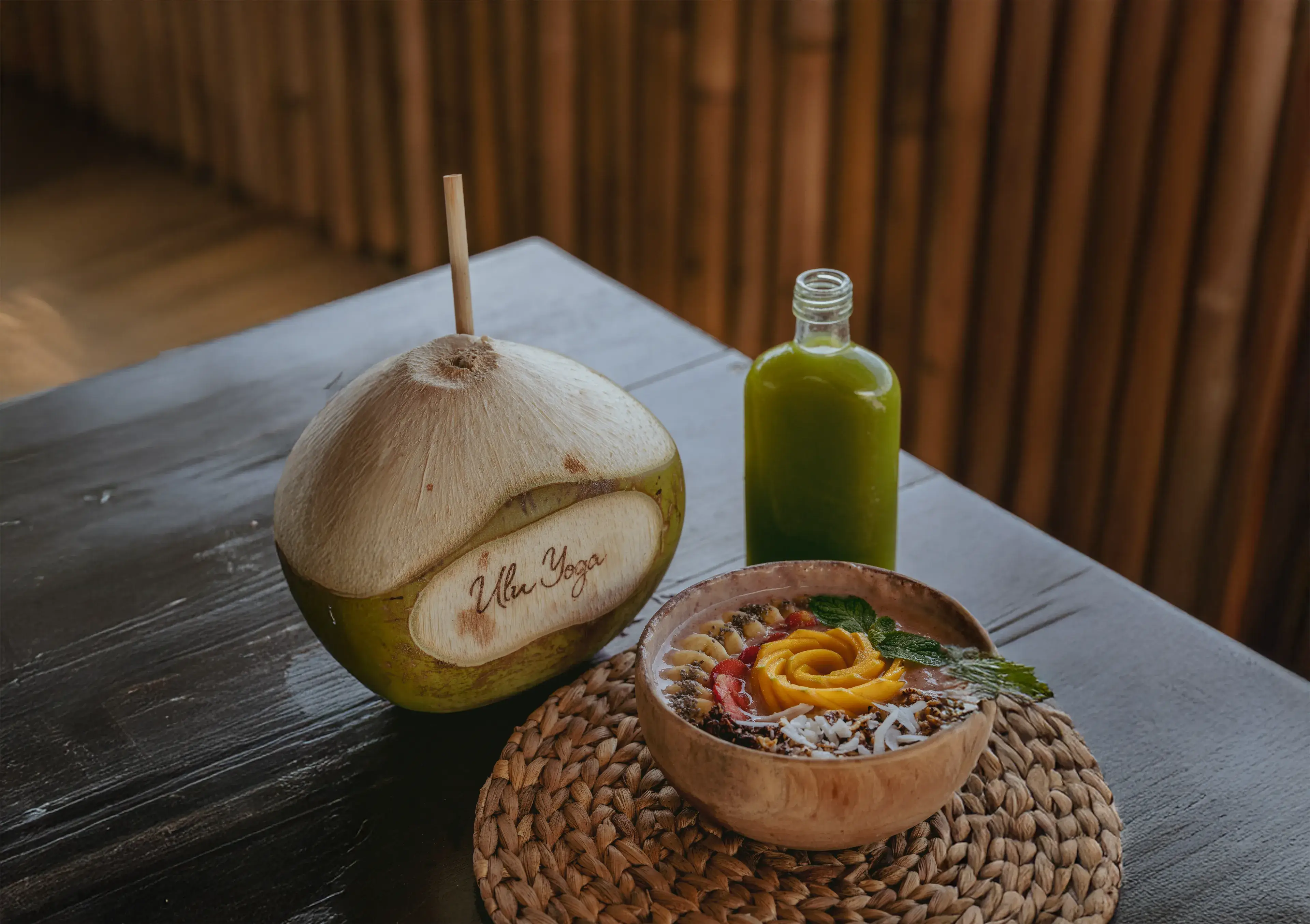 Healthy vegan smoothie bowl, green juice, and fresh coconut served daily at the Ulu Yoga Bali campus