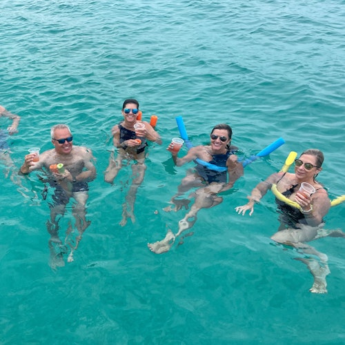 Guest having a cocktail in the water