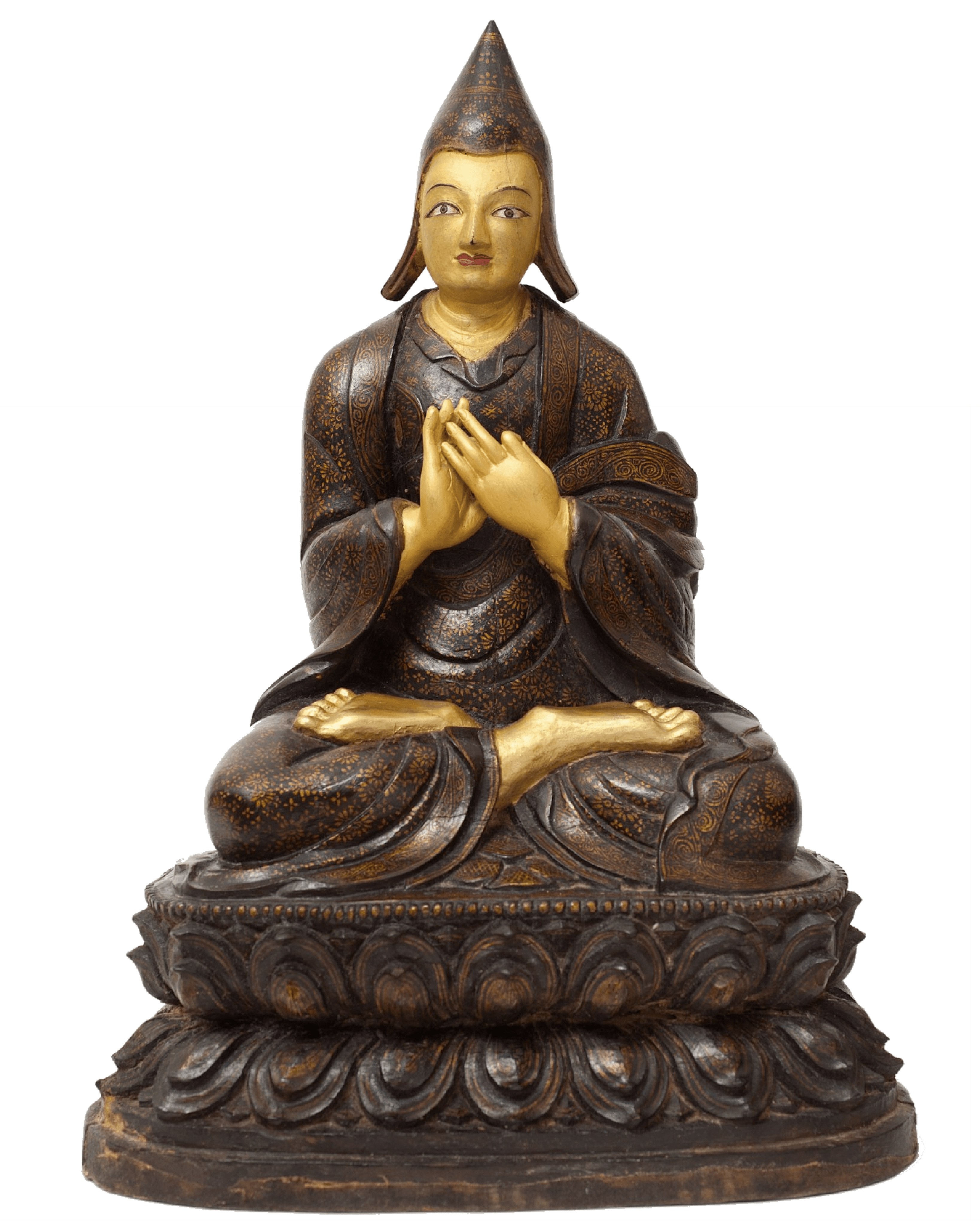 Smiling female therapist with short gray hair, wearing a brown top and a purple shawl, surrounded by a cozy background.