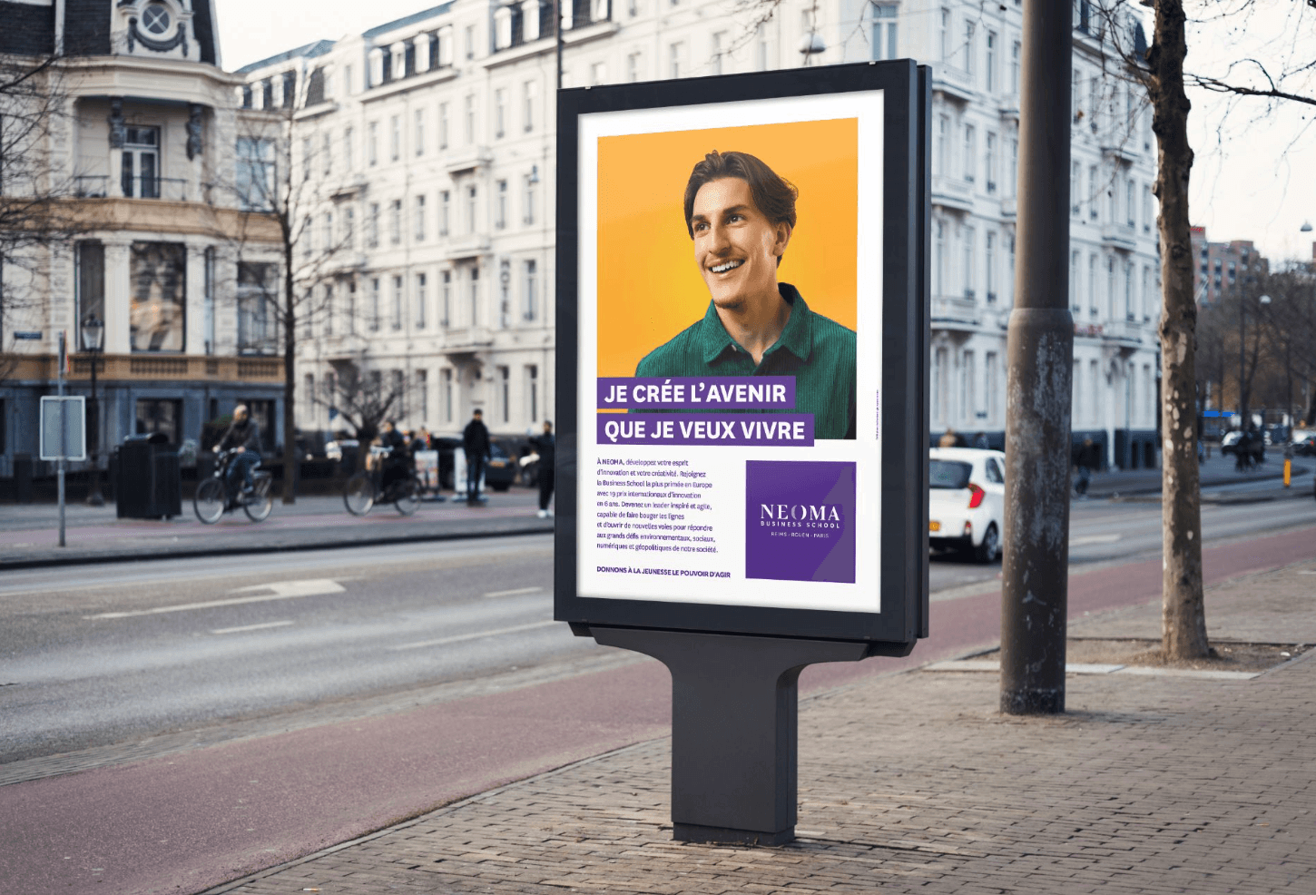 Streetside billboard with flyposters of the Batch.Works brand and illustrations