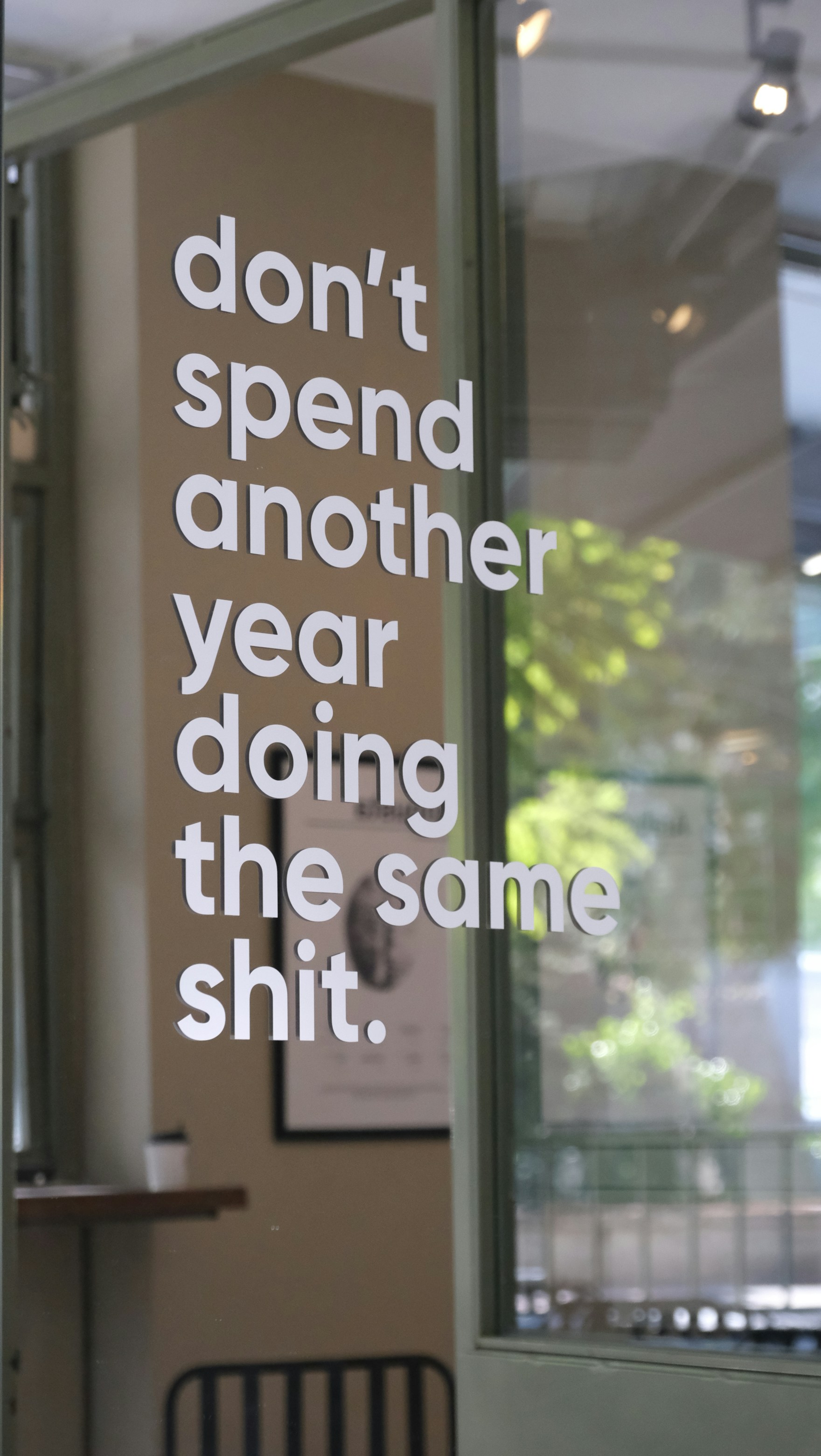 man in black t-shirt and black pants holding fire