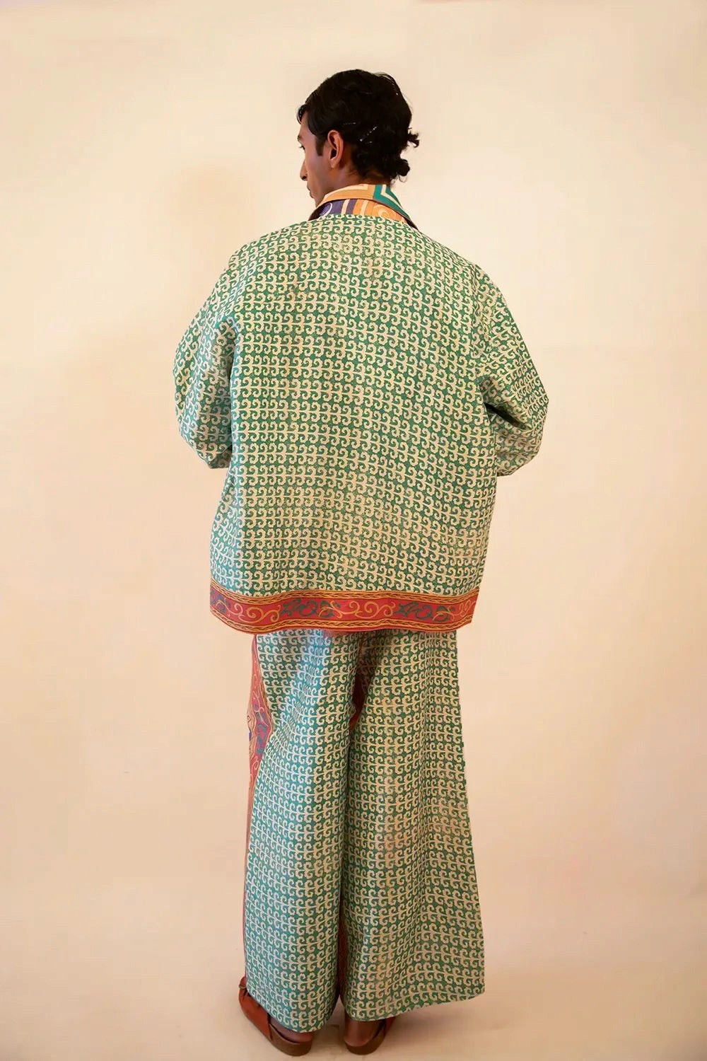 Aksa Bomber III and Wide Pant Set is our one-of-a-kind printed silk set, handcrafted by skilled artisans in-house using a one-of-a-kind vintage silk saree. 