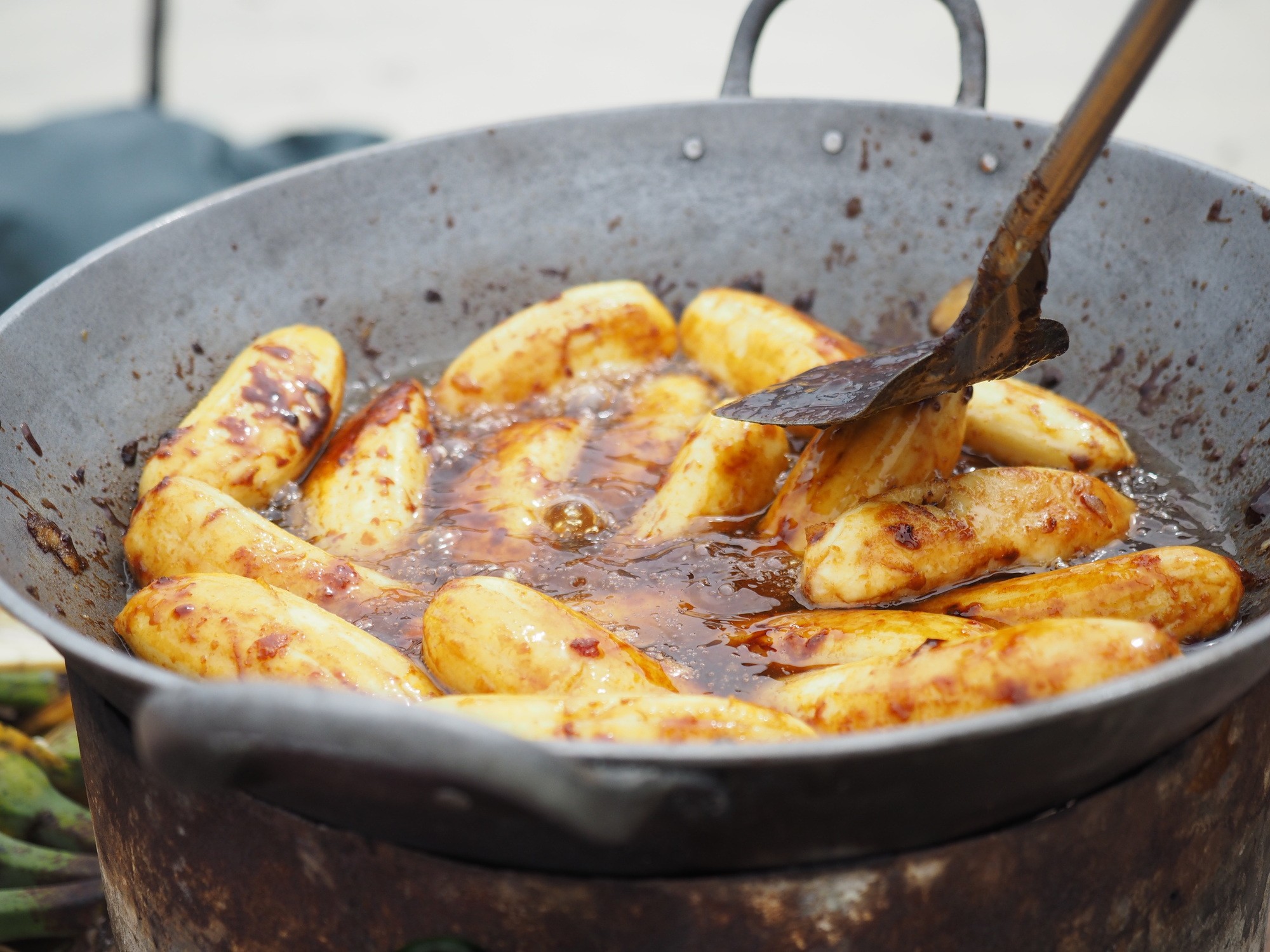 a person is holding a bowl of ice cream
