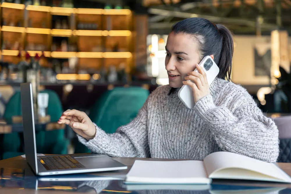 Woman in office talking on the phone