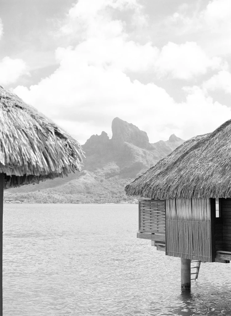 Luxury overwater bungalows in Bora Bora lagoon with Mount Otemanu, French Polynesia