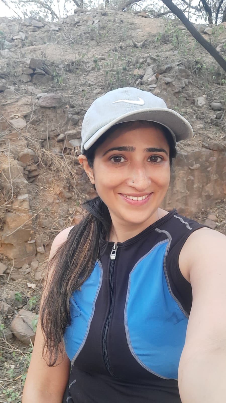 Top Second from Right: A man facing a gym mirror with another man in the reflection, preparing for a workout. Quote: “In just 10 weeks, I dropped 18 pounds…” – Nurse Practitioner.