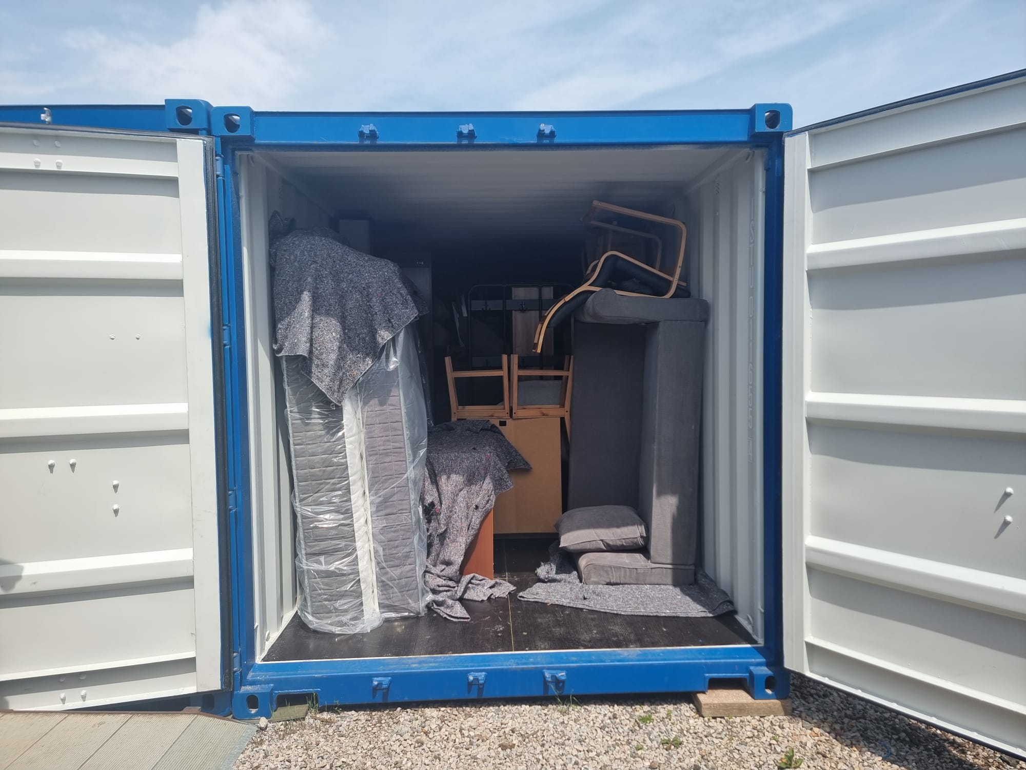 Furniture and mattresses meticulously packed into a self-storage container during a relocation from St Budeaux to Stax Storage in Saltash.
